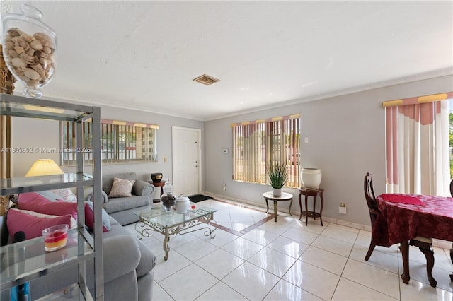 2071 SW 68th Way, Miramar, FL 33023 - living area featuring healthy amount of natural light, baseboards, light tile patterned floors, and ornamental molding