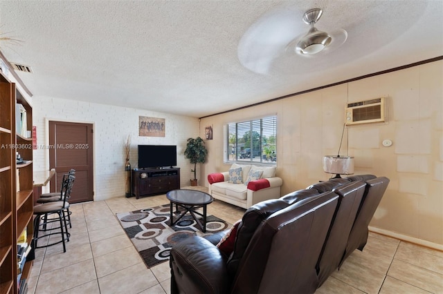 2071 SW 68th Way, Miramar, FL 33023 - living room with a wall mounted air conditioner, light tile patterned floors, a textured ceiling, and brick wall