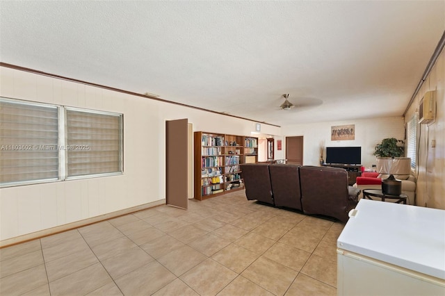 2071 SW 68th Way, Miramar, FL 33023 - living room with light tile patterned flooring, a ceiling fan, and a textured ceiling