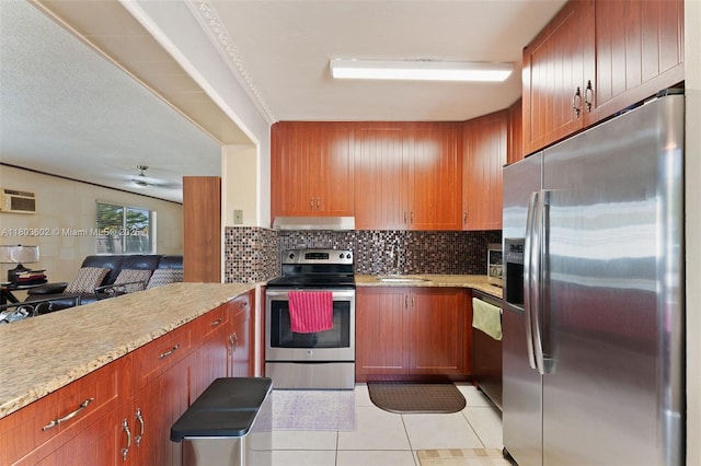2071 SW 68th Way, Miramar, FL 33023 - kitchen featuring appliances with stainless steel finishes, backsplash, light tile patterned flooring, and under cabinet range hood