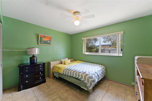2071 SW 68th Way, Miramar, FL 33023 - bedroom with light tile patterned flooring, baseboards, and a ceiling fan