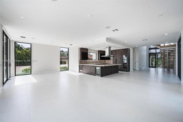 1351 Stillwater Dr, Miami Beach, FL 33141 - unfurnished living room with expansive windows
