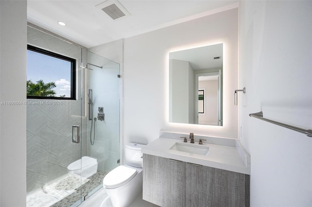 1351 Stillwater Dr, Miami Beach, FL 33141 - bathroom with toilet, vanity, and a shower stall