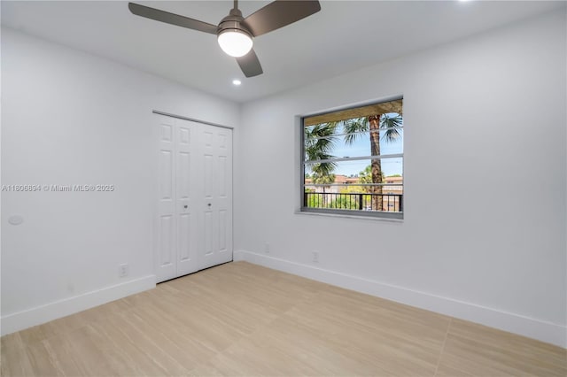 3361 NW 47th Ter Unit 329, Lauderdale Lakes, FL 33319 - unfurnished bedroom with baseboards, a closet, recessed lighting, and a ceiling fan