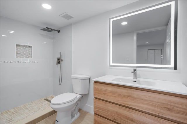 3361 NW 47th Ter Unit 329, Lauderdale Lakes, FL 33319 - full bathroom featuring toilet, a shower, vanity, and recessed lighting