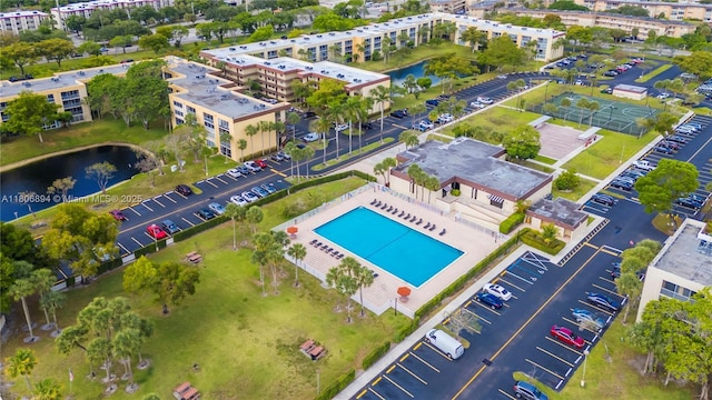 3361 NW 47th Ter Unit 329, Lauderdale Lakes, FL 33319 - aerial view of a nearby body of water, a pool area, and apartment complex / building