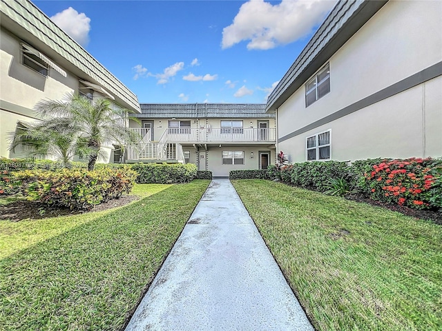 515 Monaco K Unit 515, Delray Beach, FL 33446 - surrounding community with a lawn