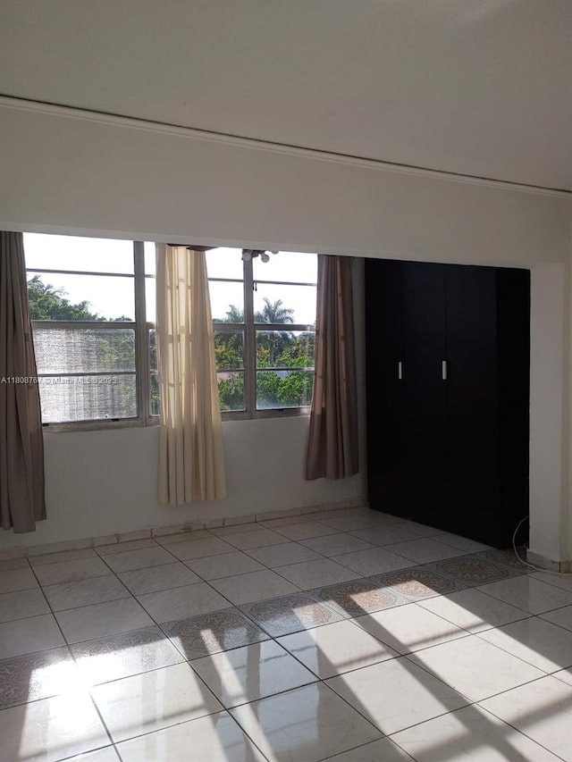 1800 SW 25th St Unit 2305, Miami, FL 33133 - spare room with light tile patterned flooring