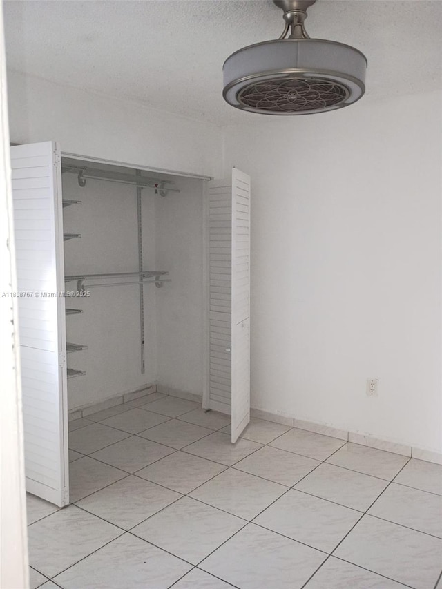 1800 SW 25th St Unit 2305, Miami, FL 33133 - unfurnished bedroom with a closet and light tile patterned floors