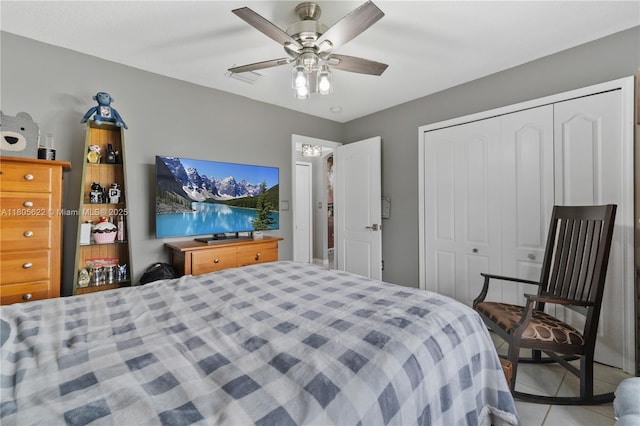 17833 SW 149th Pl, Miami, FL 33187 - bedroom with a closet, light tile patterned flooring, and ceiling fan