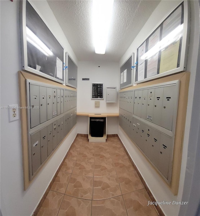 3600 NE 170th St Unit 404, North Miami Beach, FL 33160 - surrounding community with a textured ceiling and mail area