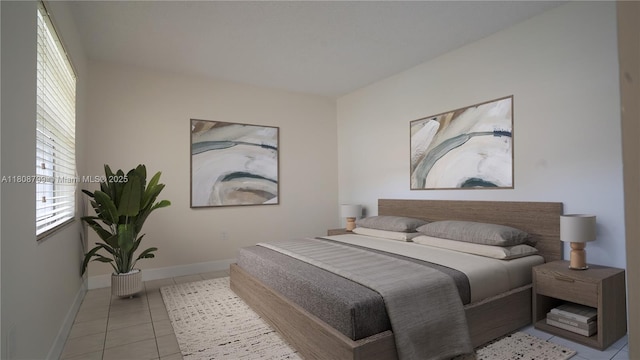 9300 W Flagler St Unit 112D, Miami, FL 33174 - bedroom featuring light tile patterned floors and baseboards