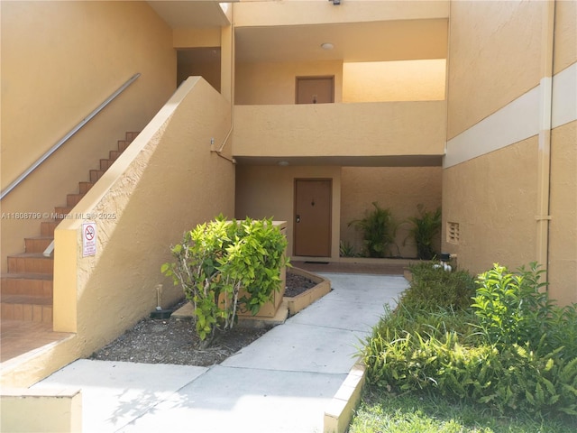 9300 W Flagler St Unit 112D, Miami, FL 33174 - property entrance featuring stucco siding