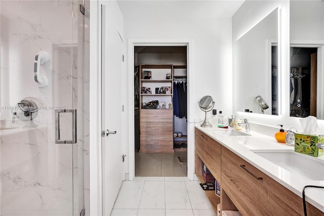 16385 Biscayne Blvd Unit 3217, North Miami Beach, FL 33160 - full bathroom with double vanity, a marble finish shower, a spacious closet, and marble finish flooring