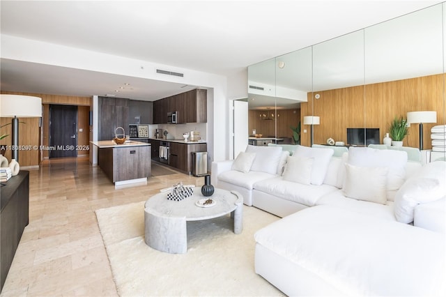 68 SE 6th St Unit 1403, Miami, FL 33131 - living area featuring wood walls