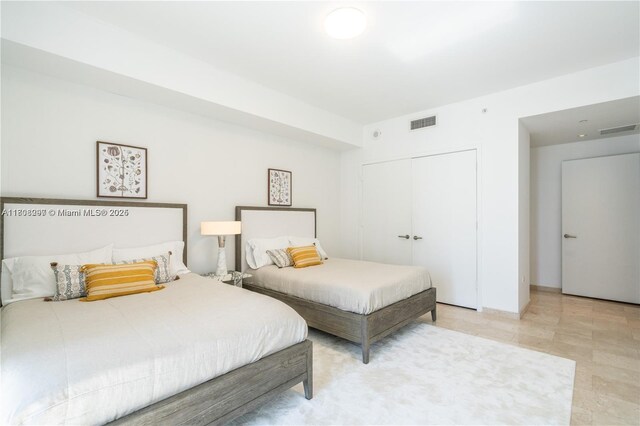 68 SE 6th St Unit 1403, Miami, FL 33131 - bedroom featuring a closet
