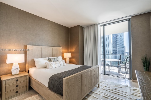 68 SE 6th St Unit 1403, Miami, FL 33131 - bedroom featuring expansive windows and access to outside