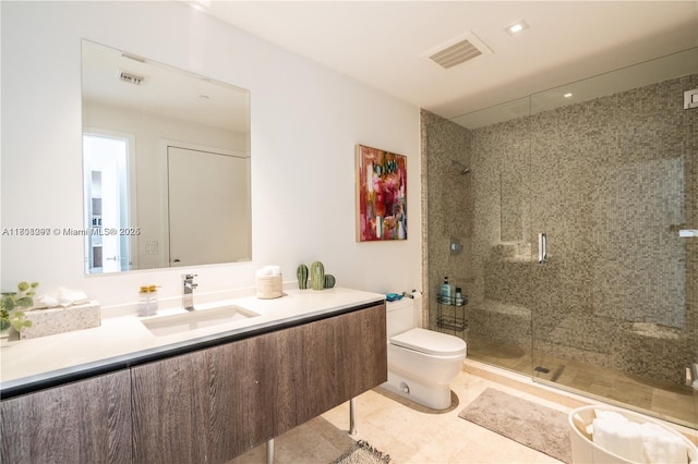 68 SE 6th St Unit 1403, Miami, FL 33131 - full bathroom featuring vanity, toilet, a shower stall, and tile patterned flooring