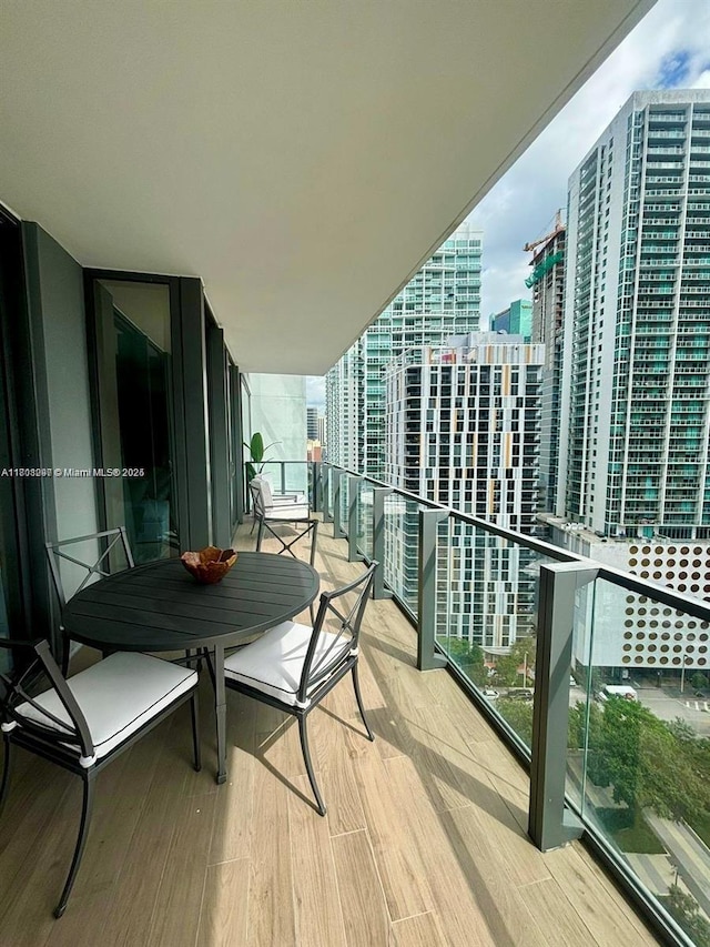 68 SE 6th St Unit 1403, Miami, FL 33131 - balcony featuring a view of city