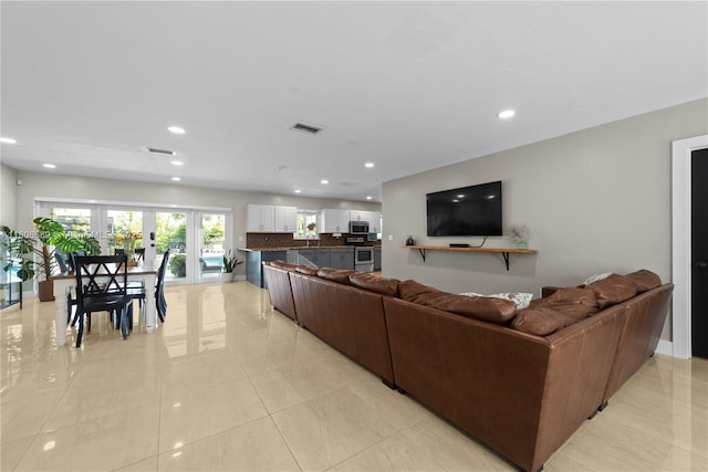 19525 SW 272nd St, Homestead, FL 33031 - living area featuring recessed lighting, light tile patterned floors, and french doors