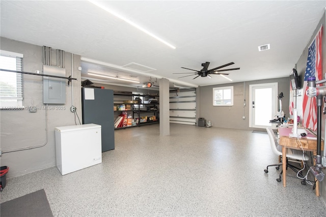 19525 SW 272nd St, Homestead, FL 33031 - garage featuring freestanding refrigerator, refrigerator, ceiling fan, and electric panel