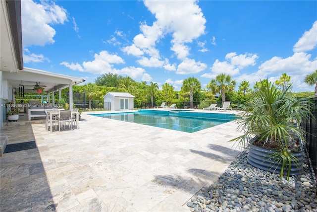 19525 SW 272nd St, Homestead, FL 33031 - view of swimming pool with a patio area, outdoor dining area, and ceiling fan