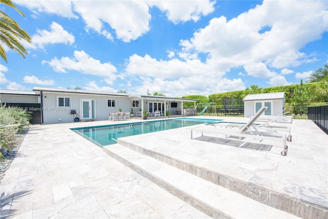 19525 SW 272nd St, Homestead, FL 33031 - view of pool with a patio area and french doors