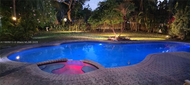 2442 Fillmore St, Hollywood, FL 33020 - view of swimming pool with a pool with connected hot tub