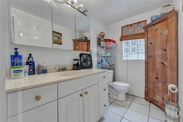 2442 Fillmore St, Hollywood, FL 33020 - bathroom featuring tile walls, tile patterned flooring, and vanity