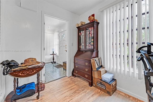 2442 Fillmore St, Hollywood, FL 33020 - foyer featuring wood finished floors and baseboards