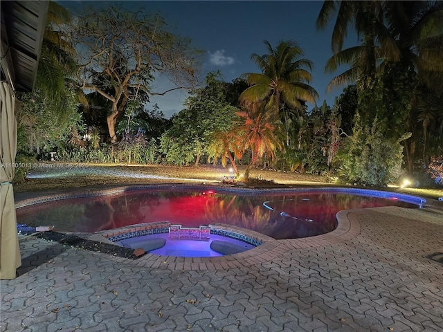 2442 Fillmore St, Hollywood, FL 33020 - pool at twilight with an outdoor pool and an in-ground hot tub