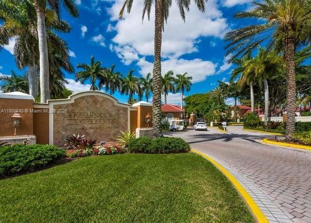2173 Renaissance Blvd Unit 204, Miramar, FL 33025 - community / neighborhood sign featuring a lawn