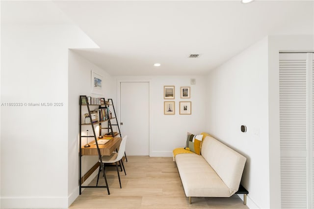 121 NE 34th St Unit 2412, Miami, FL 33137 - sitting room featuring light wood finished floors, recessed lighting, and baseboards
