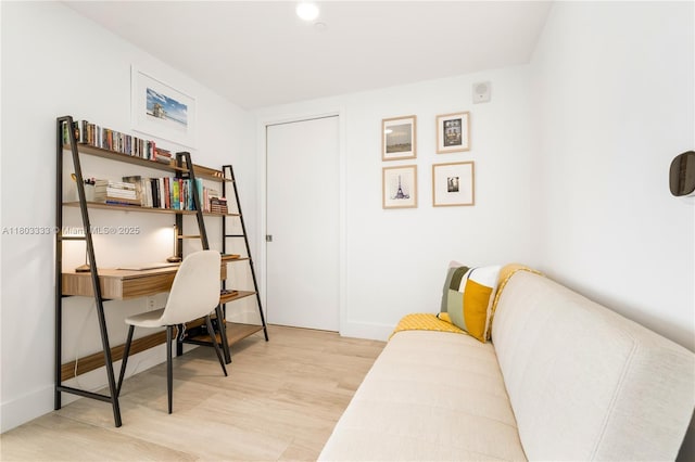 121 NE 34th St Unit 2412, Miami, FL 33137 - office area featuring light wood-type flooring and baseboards