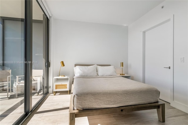 121 NE 34th St Unit 2412, Miami, FL 33137 - bedroom with wood finished floors