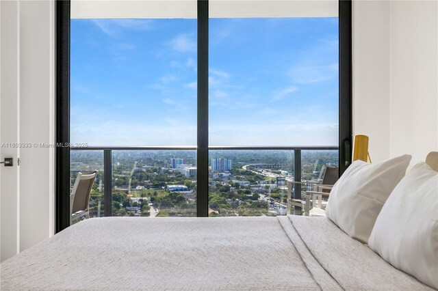 121 NE 34th St Unit 2412, Miami, FL 33137 - bedroom with a view of city