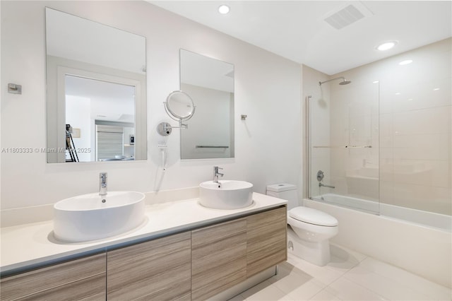 121 NE 34th St Unit 2412, Miami, FL 33137 - bathroom featuring toilet, shower / tub combination, double vanity, and tile patterned flooring