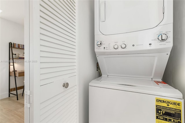 121 NE 34th St Unit 2412, Miami, FL 33137 - laundry area featuring estacked washer and dryer