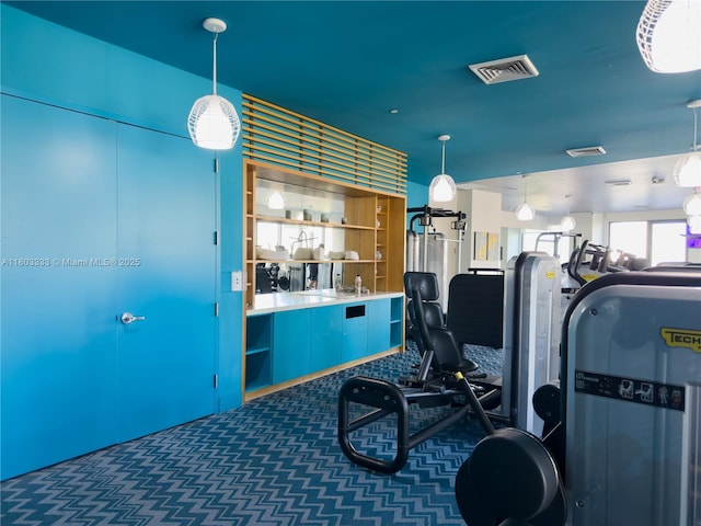 121 NE 34th St Unit 2412, Miami, FL 33137 - exercise room with carpet