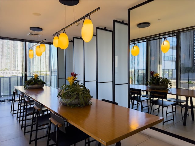 121 NE 34th St Unit 2412, Miami, FL 33137 - dining space with floor to ceiling windows and healthy amount of natural light