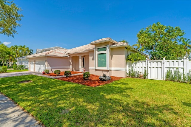 3560 SW 145th Ave, Miramar, FL 33027 - mediterranean / spanish-style house with stucco siding, driveway, a garage, and a tile roof