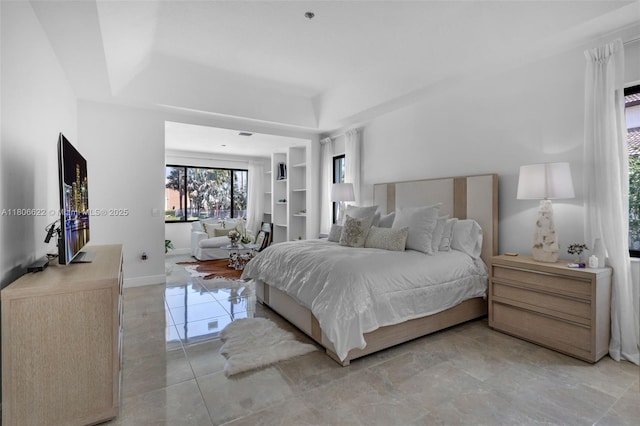 3560 SW 145th Ave, Miramar, FL 33027 - bedroom featuring a tray ceiling and light tile patterned floors