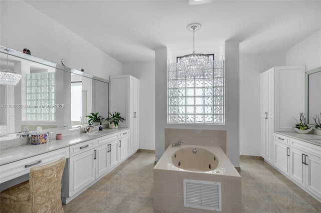 3560 SW 145th Ave, Miramar, FL 33027 - full bath featuring a chandelier, vanity, and a whirlpool tub