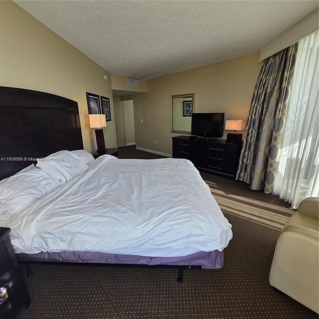 17375 Collins Ave Unit 1101, Sunny Isles Beach, FL 33160 - carpeted bedroom with a textured ceiling