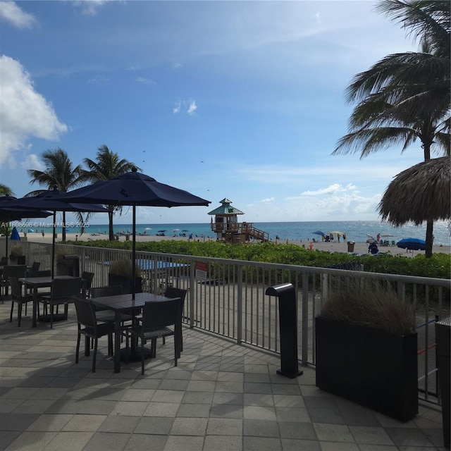 17375 Collins Ave Unit 1101, Sunny Isles Beach, FL 33160 - view of patio featuring a water view and outdoor dining area