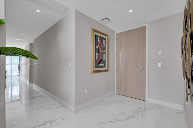 15701 Collins Ave Unit 705, Sunny Isles Beach, FL 33160 - hall featuring attic access, light marble finish flooring, baseboards, and recessed lighting
