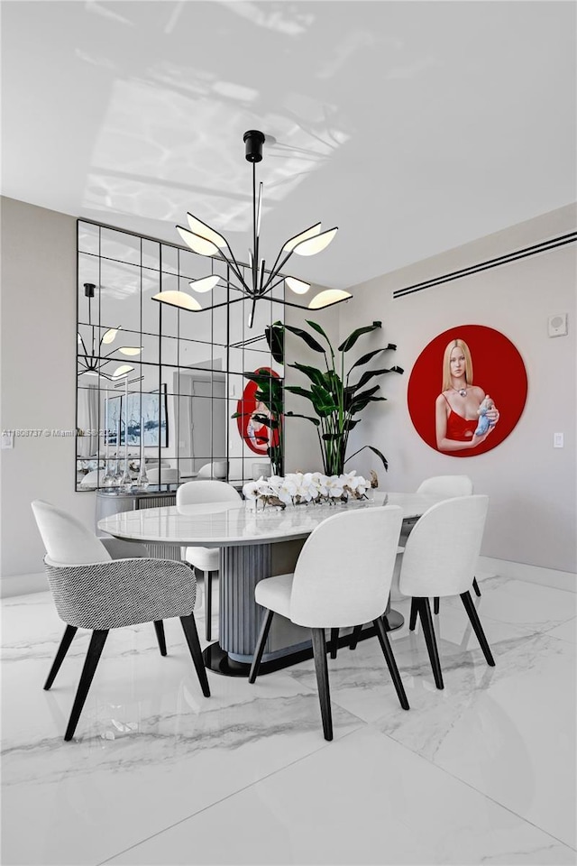 15701 Collins Ave Unit 705, Sunny Isles Beach, FL 33160 - dining room with marble finish floors, a chandelier, baseboards, and floor to ceiling windows
