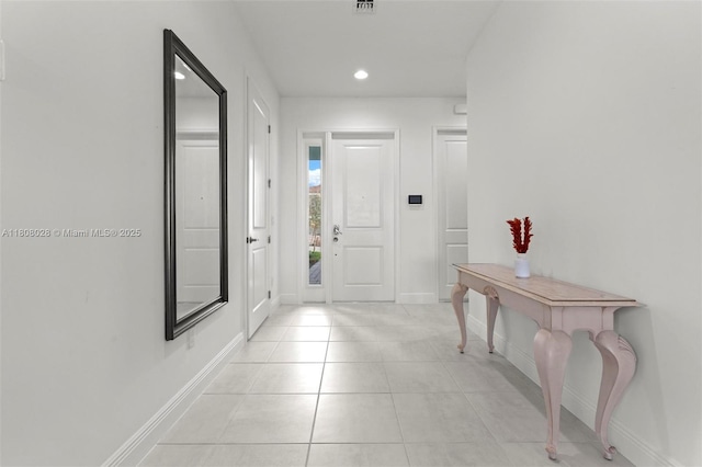 16450 Sea Turtle Pl, Loxahatchee, FL 33470 - foyer entrance featuring baseboards, light tile patterned flooring, and recessed lighting