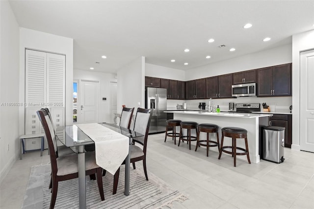 16450 Sea Turtle Pl, Loxahatchee, FL 33470 - dining room with recessed lighting and light tile patterned flooring