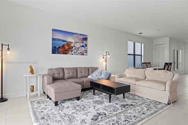 16450 Sea Turtle Pl, Loxahatchee, FL 33470 - living area featuring light tile patterned flooring and baseboards